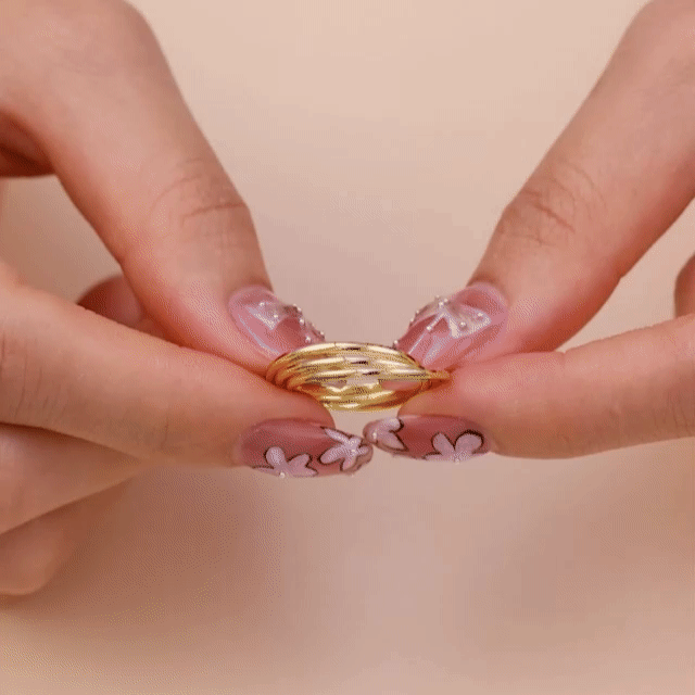 Vielring - Verschlungener Anti-Stress-Ring - Edelstahl / Gold / 49 | ø15.6