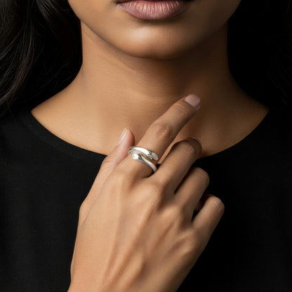 Vielring sterling silver open hug ring symbolizing love and connection, adjustable fit.